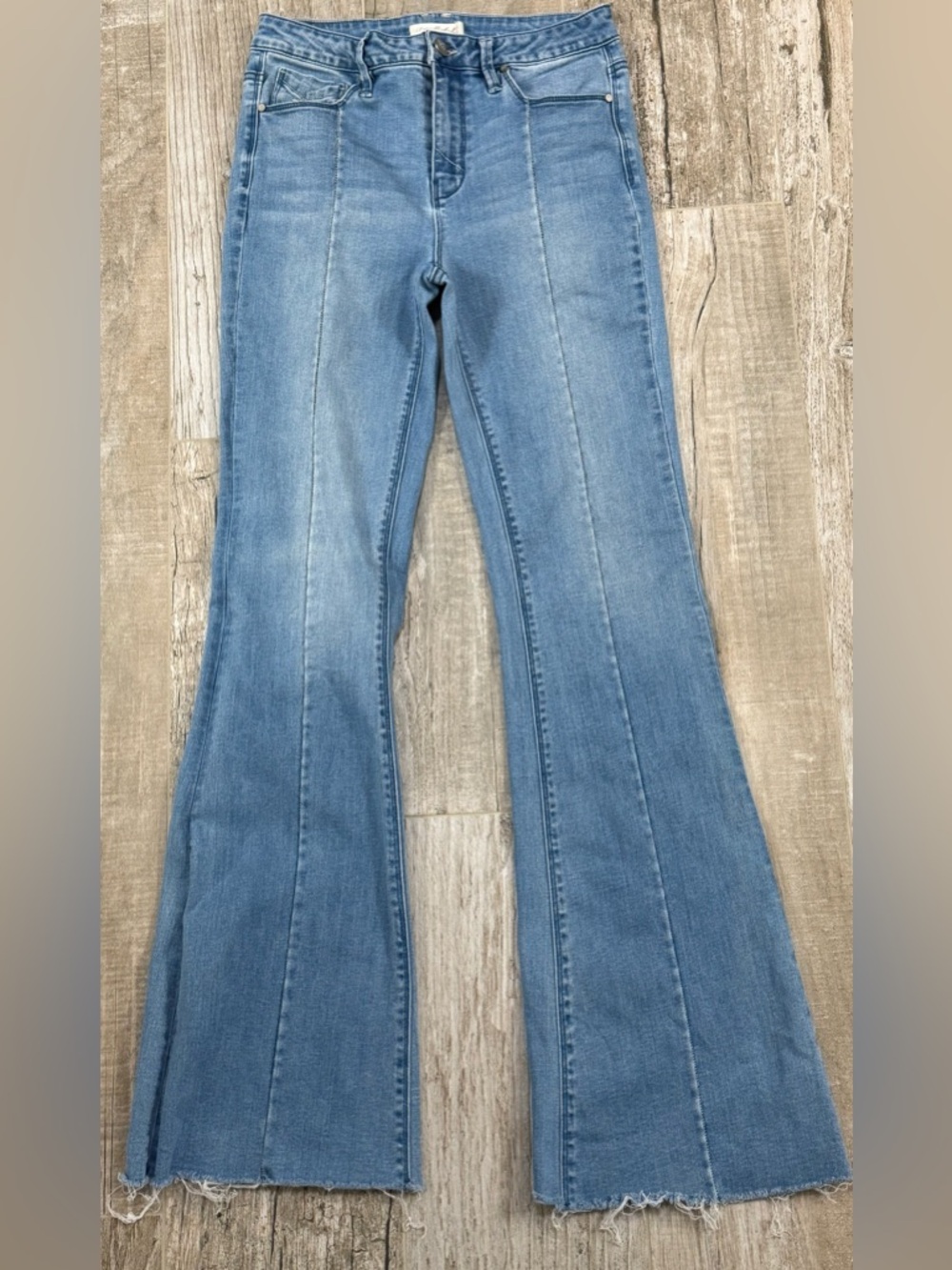 Unpublished Light Blue High-Rise Flare Jeans with Front Seams and Raw Hem